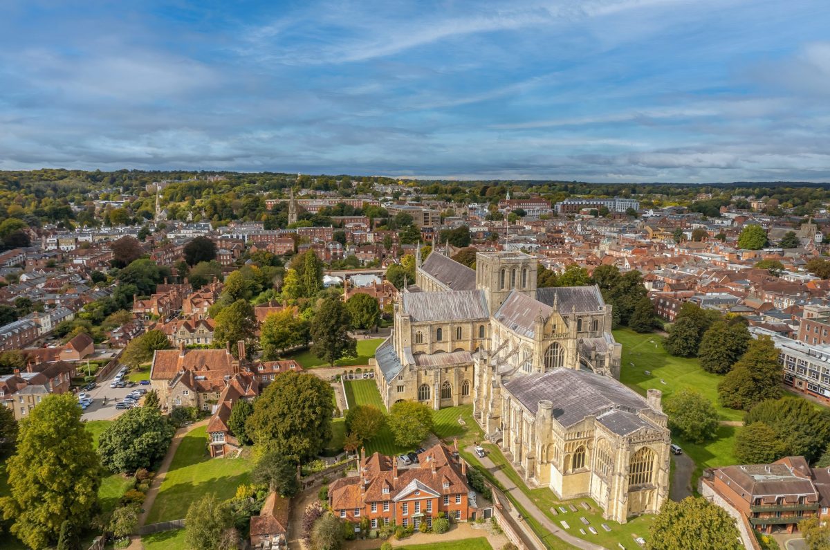 Drone aerial view of Winchester Cathedral & Winchester city â home of Woolley & Wallis estate agents